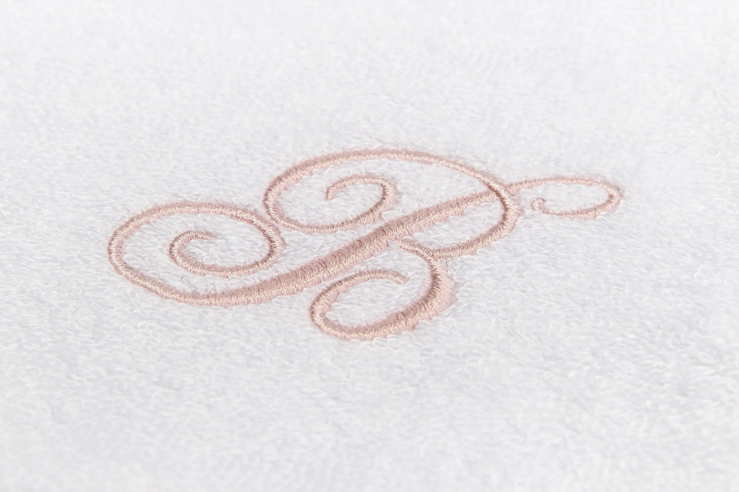 Beltrami Baby monogram embroidered on Autentica Fibra di Legno cloth